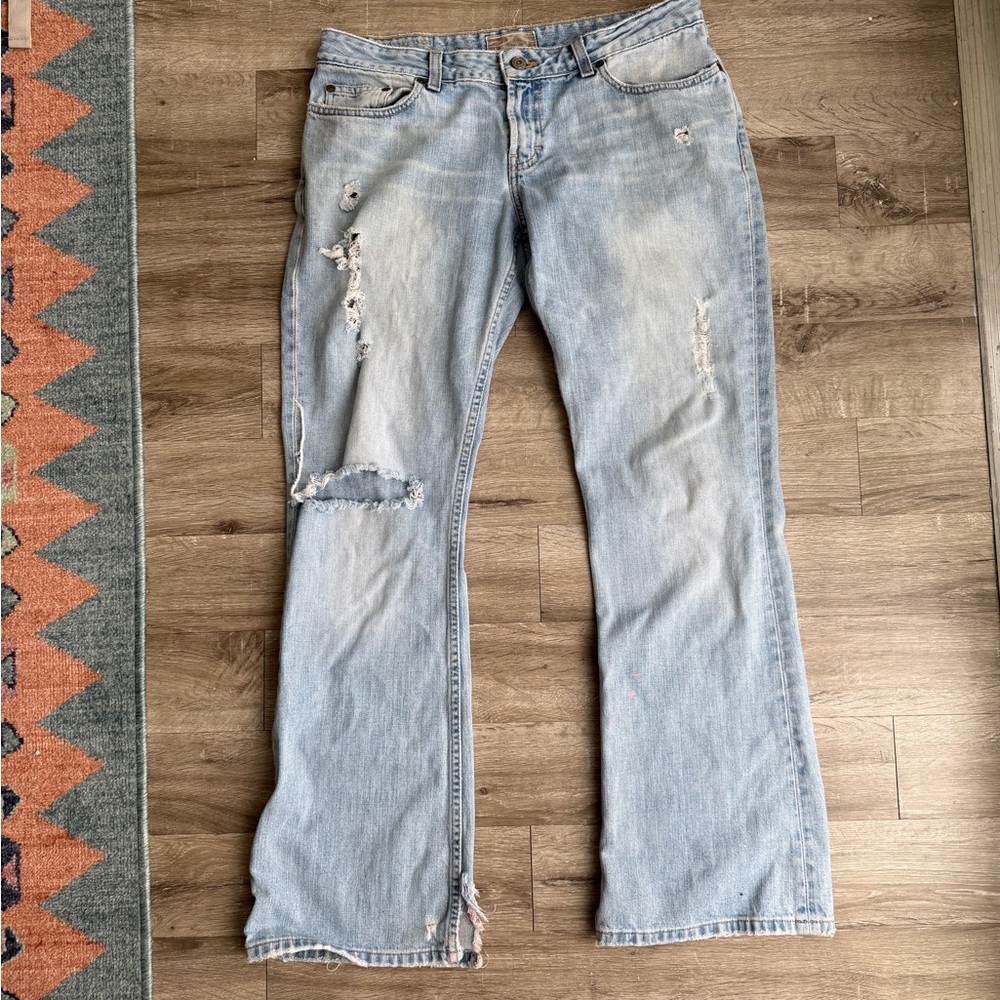 Buckle Light Wash Distressed Boot Cut Jeans